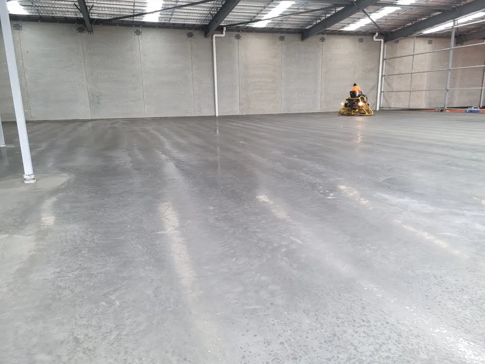 Burnished concrete warehouse floor completed by A and J Contractors in Largs North